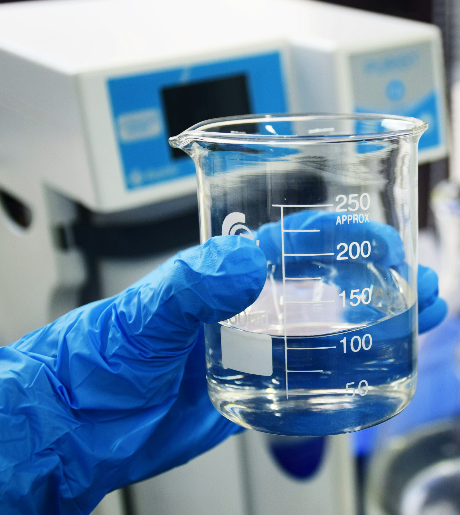 Technician collecting a water sample in a school — Custom Testing for Schools & Care Facilities to detect Legionella, metals, and bacteria